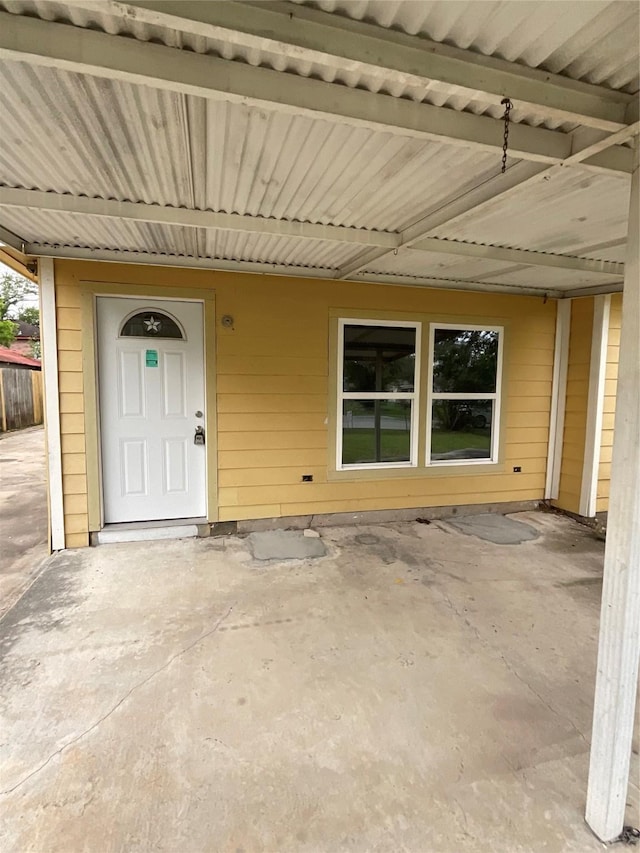 entrance to property with a patio area