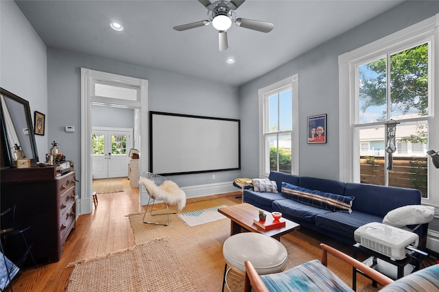 1818 Decatur St, Houston, TX 77007 - cinema featuring light wood-style flooring, recessed lighting, ceiling fan, and baseboards