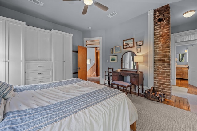 1818 Decatur St, Houston, TX 77007 - bedroom with wood finished floors, baseboards, and a ceiling fan