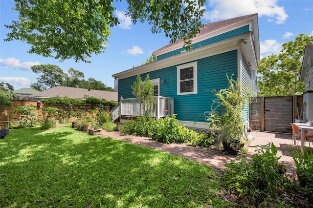 1818 Decatur St, Houston, TX 77007 - rear view of property featuring a wooden deck