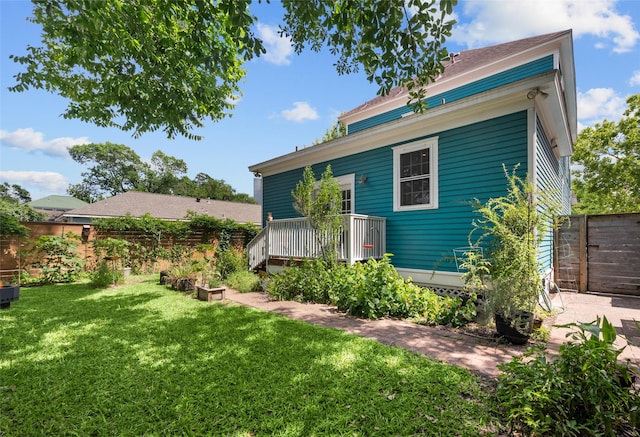 1818 Decatur St, Houston, TX 77007 - rear view of house with a wooden deck