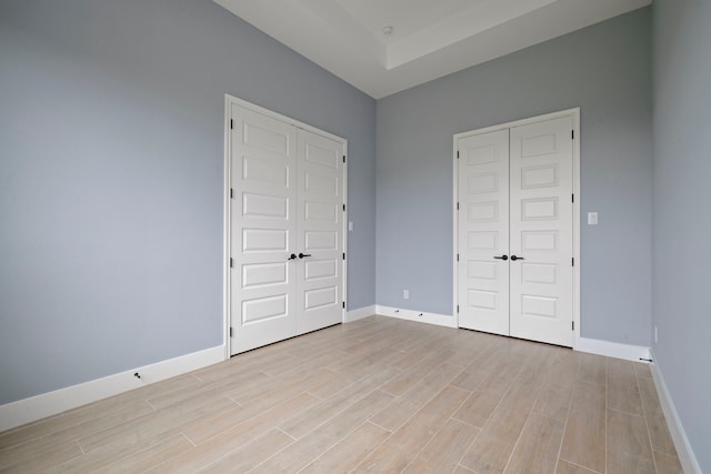 250 Hampton Glen Rd, Montgomery, TX 77356 - unfurnished bedroom featuring light wood-type flooring, baseboards, and a closet