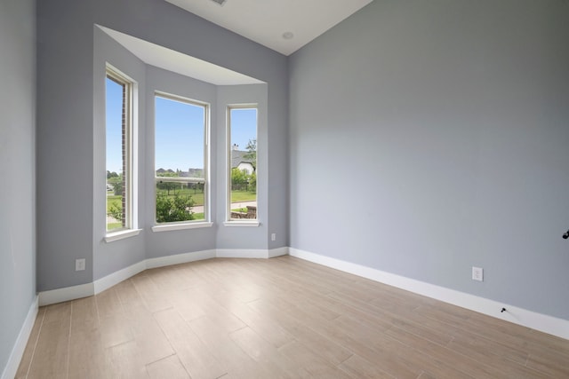 250 Hampton Glen Rd, Montgomery, TX 77356 - spare room featuring light wood-style floors and baseboards