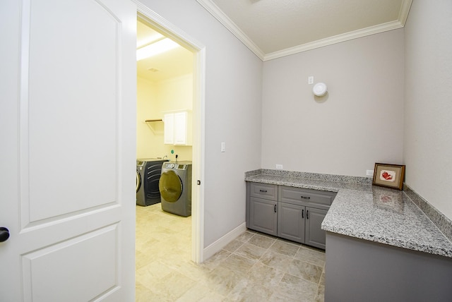bar with washer and dryer, crown molding, and baseboards