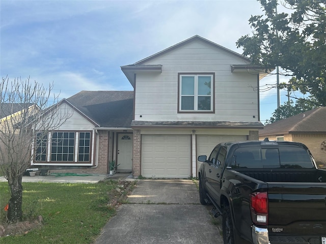 13507 White Cliff Dr, Houston, TX 77065 - traditional-style house with driveway, brick siding, a garage, a front lawn, and a shingled roof