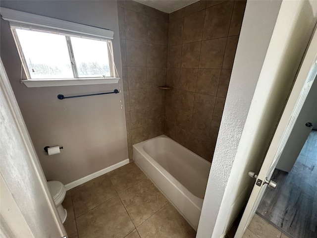 13507 White Cliff Dr, Houston, TX 77065 - bathroom featuring tile patterned floors, toilet, and baseboards