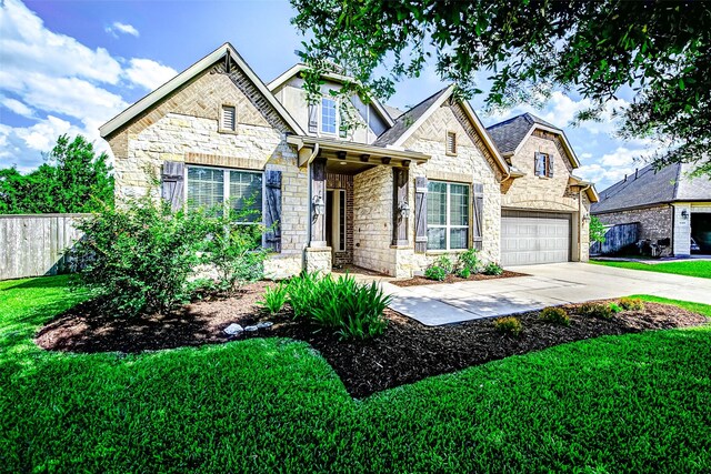 6315 Asbury Brook Ct, Katy, TX 77493 - view of front of property with stone siding, a garage, and concrete driveway