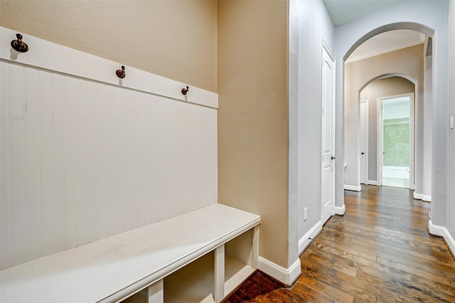 6315 Asbury Brook Ct, Katy, TX 77493 - mudroom featuring arched walkways, dark wood finished floors, and baseboards