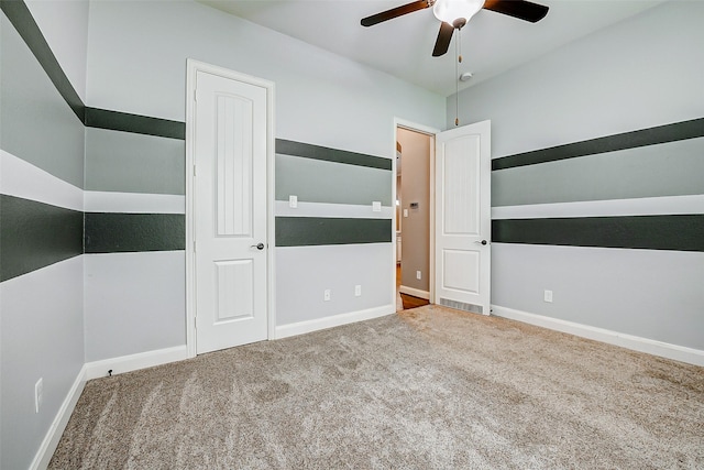 6315 Asbury Brook Ct, Katy, TX 77493 - empty room featuring carpet floors, ceiling fan, and baseboards