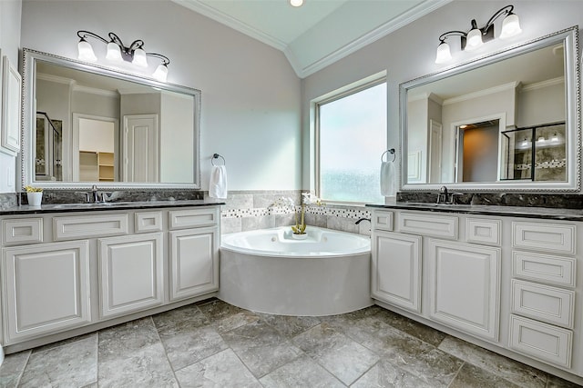 6315 Asbury Brook Ct, Katy, TX 77493 - full bathroom featuring crown molding, vaulted ceiling, a bath, a stall shower, and two vanities