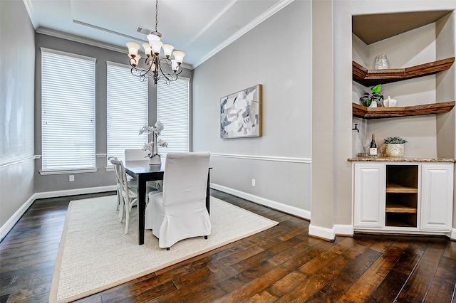 6315 Asbury Brook Ct, Katy, TX 77493 - dining space with ornamental molding, a chandelier, dark wood-type flooring, and baseboards