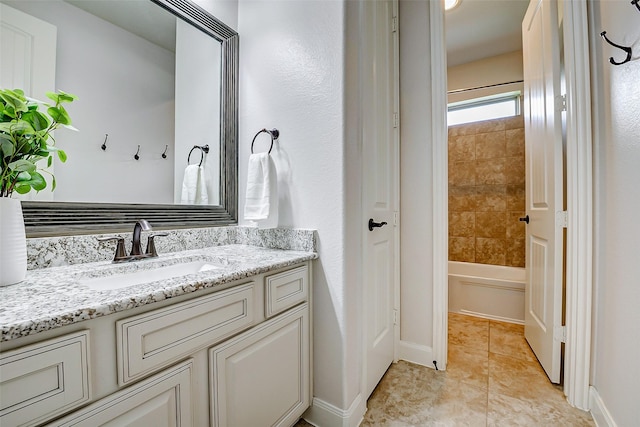6315 Asbury Brook Ct, Katy, TX 77493 - full bathroom with baseboards, vanity, and tile patterned flooring
