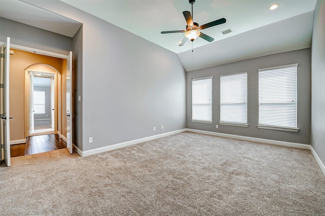 6315 Asbury Brook Ct, Katy, TX 77493 - carpeted spare room with a ceiling fan, baseboards, vaulted ceiling, arched walkways, and recessed lighting