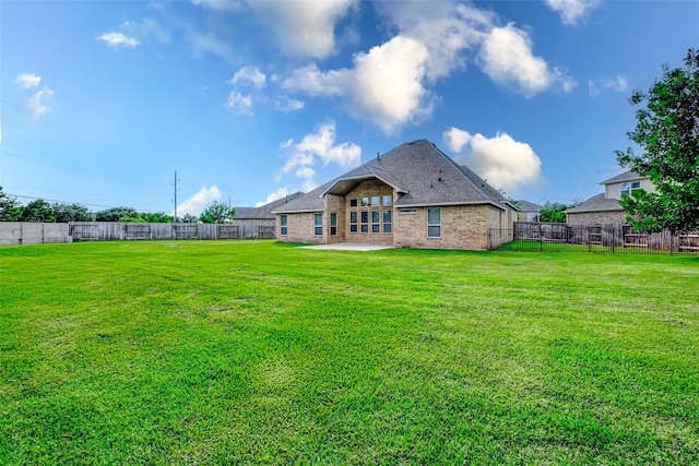 6315 Asbury Brook Ct, Katy, TX 77493 - rear view of property featuring a patio area and brick siding