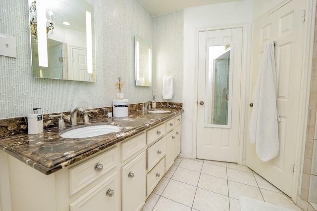 11810 Braesridge Dr, Houston, TX 77071 - bathroom with tile patterned floors, double vanity, and a shower