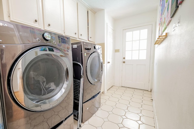 11810 Braesridge Dr, Houston, TX 77071 - laundry room featuring washing machine and clothes dryer and cabinet space