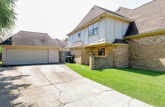 11810 Braesridge Dr, Houston, TX 77071 - back of house featuring brick siding, board and batten siding, a garage, and roof with shingles