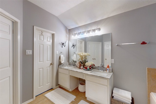 13931 Pueblo Run, Cypress, TX 77429 - full bath featuring tile patterned floors, lofted ceiling, and double vanity