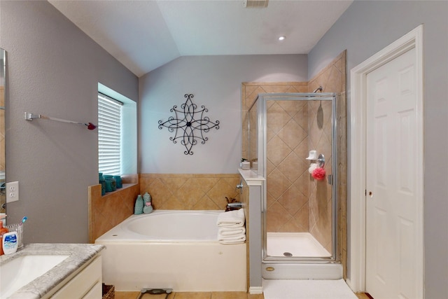13931 Pueblo Run, Cypress, TX 77429 - full bath with a stall shower, a bath, vanity, and lofted ceiling