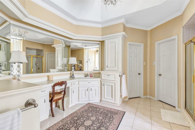 full bath with a stall shower, tile patterned flooring, crown molding, a chandelier, and vanity