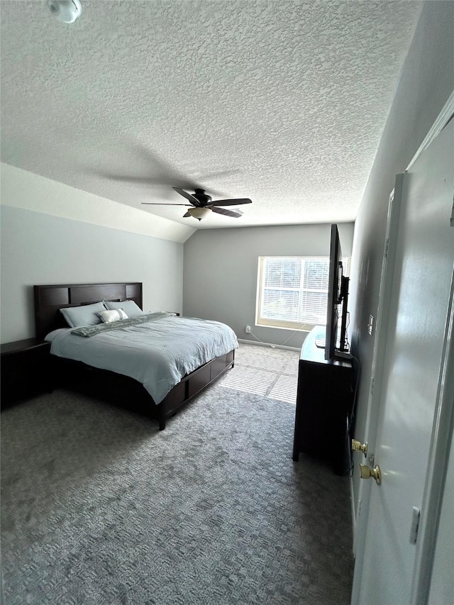 bedroom featuring a textured ceiling, carpet, ceiling fan, and vaulted ceiling