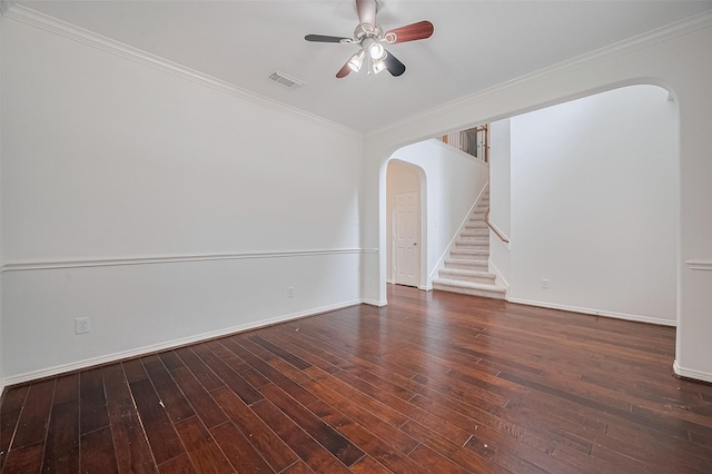 4142 Regal Stone Ln, Sugar Land, TX 77479 - spare room with arched walkways, ornamental molding, stairway, ceiling fan, and baseboards