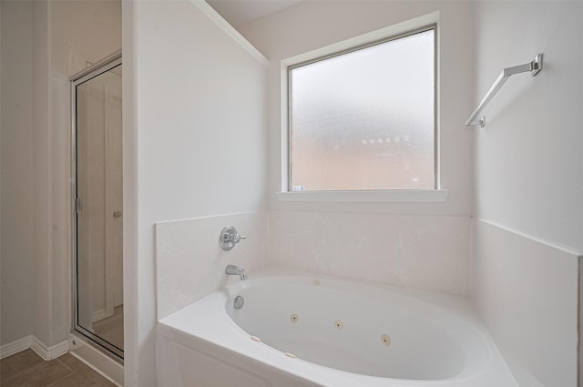 4142 Regal Stone Ln, Sugar Land, TX 77479 - full bath with a tub with jets and a stall shower