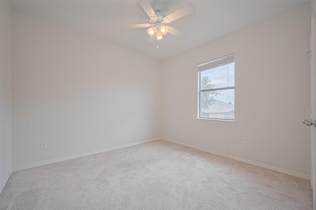 4142 Regal Stone Ln, Sugar Land, TX 77479 - empty room featuring light colored carpet, baseboards, and a ceiling fan