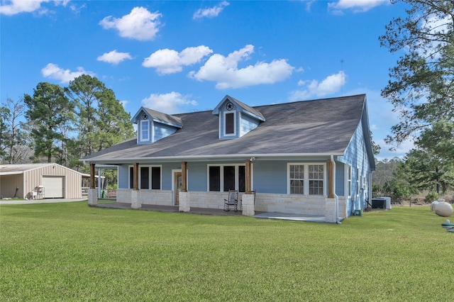 20900 Welch Rd, Richards, TX 77873 - rear view of property with a garage, central air condition unit, a yard, an outbuilding, and stone siding