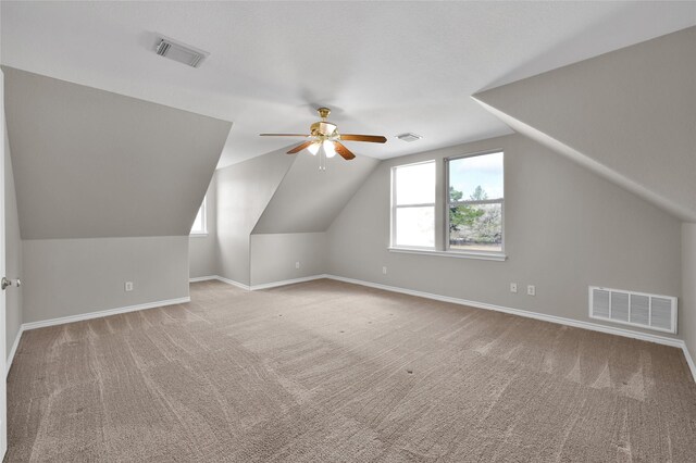 20900 Welch Rd, Richards, TX 77873 - bonus room featuring carpet floors, a ceiling fan, lofted ceiling, and baseboards