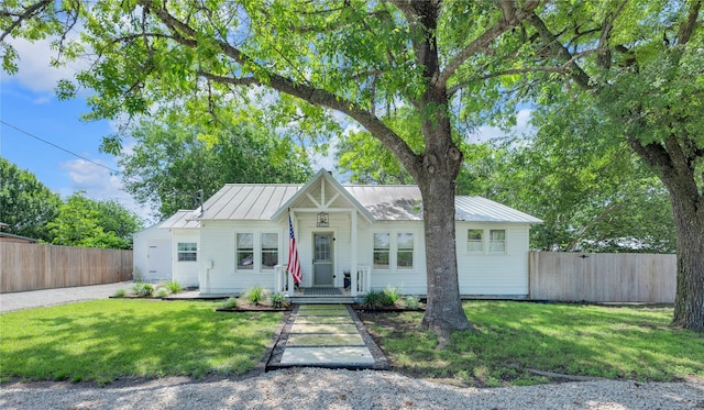 6020 State Highway 159, La Grange, TX 78945 - view of front facade featuring covered porch, metal roof, and a standing seam roof