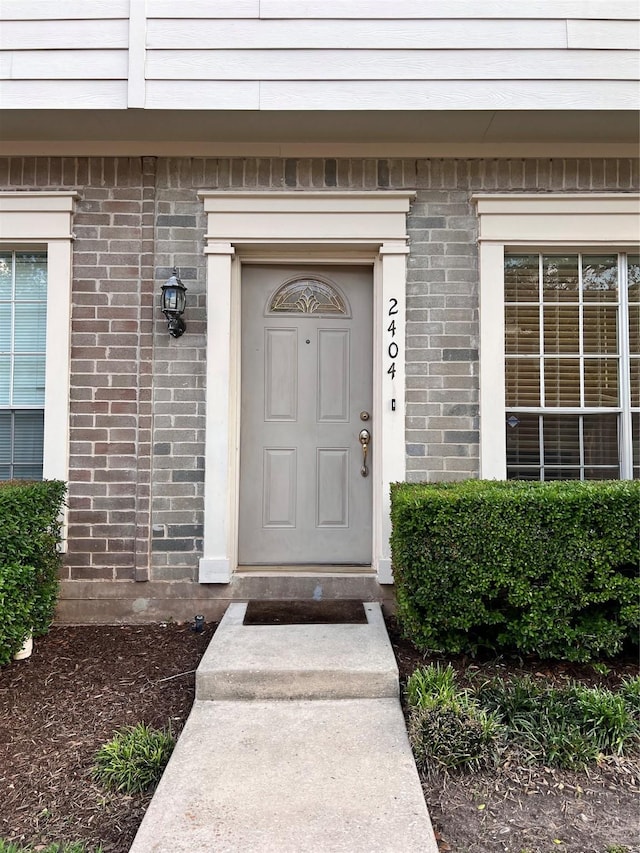 2930 Grants Lake Blvd Unit 2404, Sugar Land, TX 77479 - doorway to property featuring brick siding
