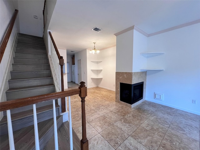 2930 Grants Lake Blvd Unit 2404, Sugar Land, TX 77479 - staircase featuring a chandelier, a multi sided fireplace, baseboards, and crown molding