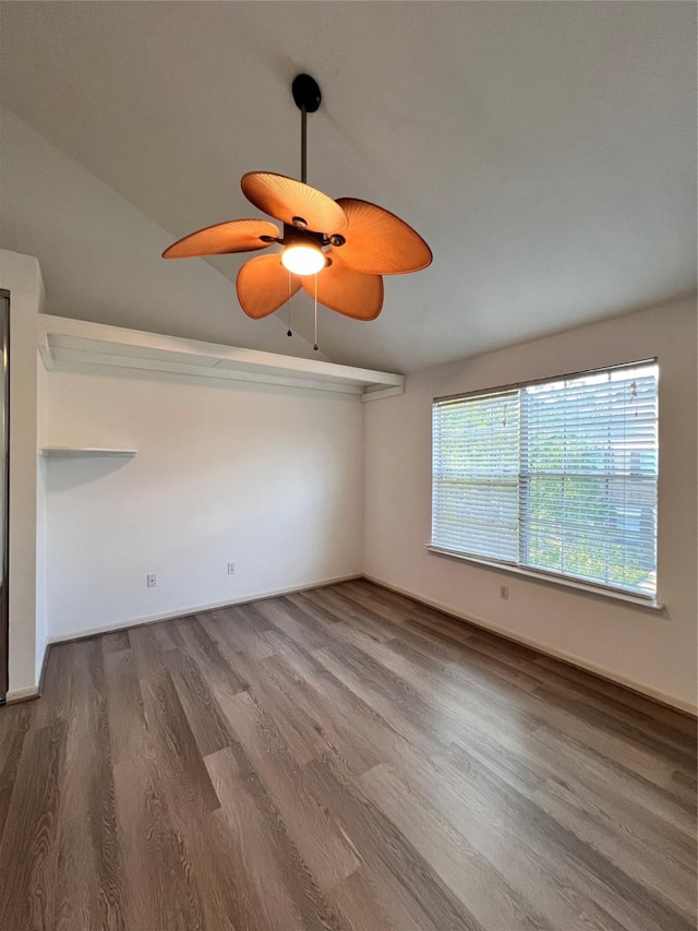 2930 Grants Lake Blvd Unit 2404, Sugar Land, TX 77479 - spare room featuring wood finished floors, a ceiling fan, and baseboards