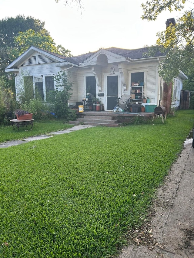 3439 5th St, Port Arthur, TX 77642 - view of front facade featuring a front yard
