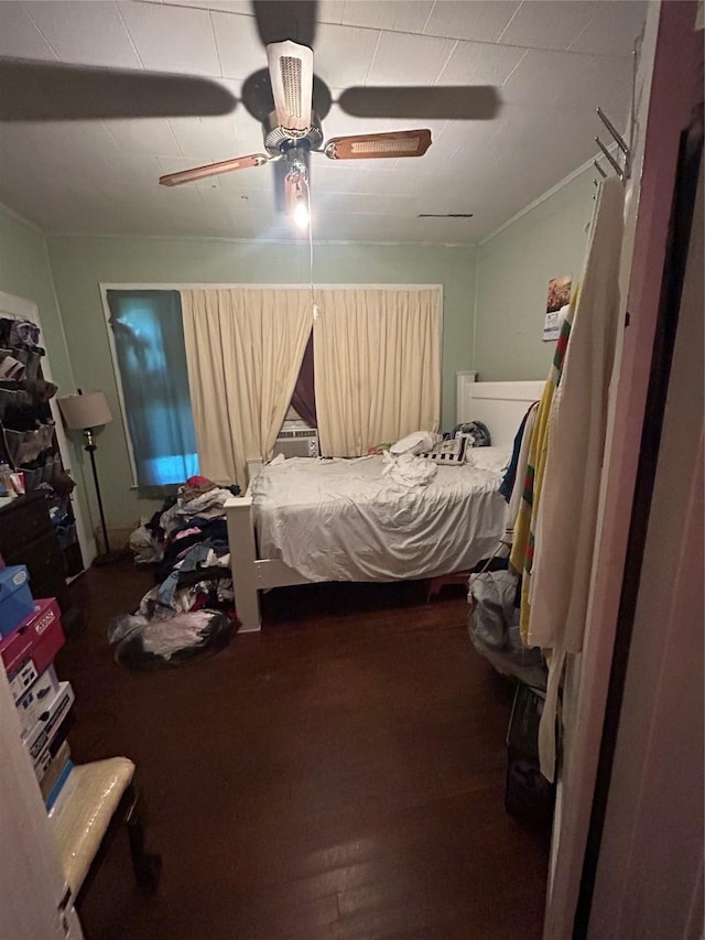 3439 5th St, Port Arthur, TX 77642 - bedroom with a ceiling fan and wood finished floors