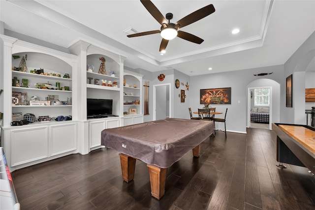 3315 Spring Branch Rd, Montgomery, TX 77316 - playroom featuring a tray ceiling, ceiling fan, dark wood-type flooring, arched walkways, and recessed lighting