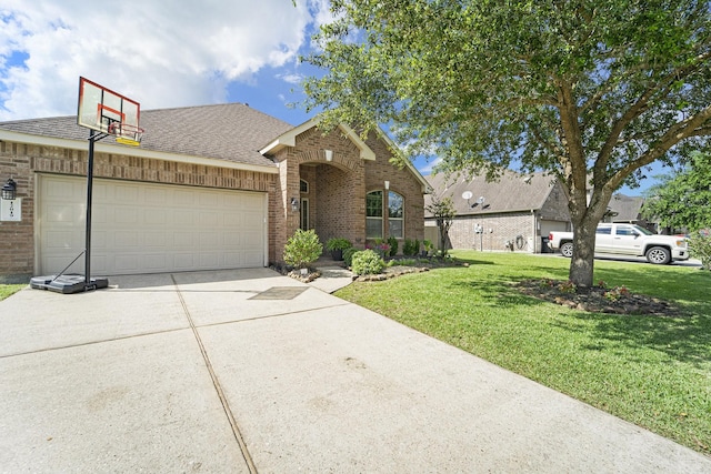 12019 Eagle Ridge Dr, Dayton, TX 77535 - traditional-style home with brick siding, an attached garage, driveway, a front lawn, and a shingled roof