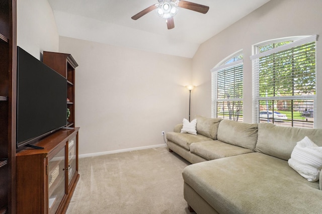12019 Eagle Ridge Dr, Dayton, TX 77535 - living area with a ceiling fan, light colored carpet, vaulted ceiling, and baseboards