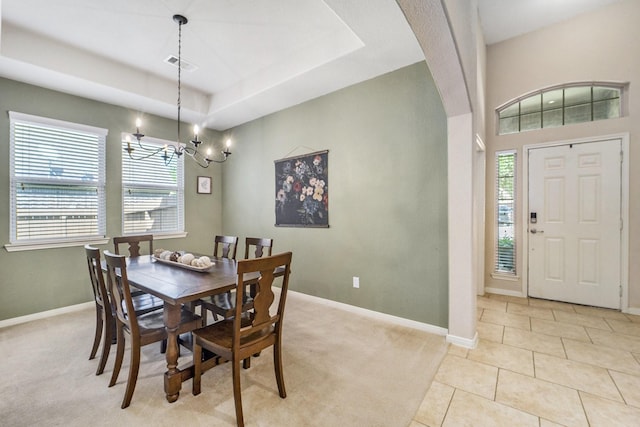 12019 Eagle Ridge Dr, Dayton, TX 77535 - dining room with arched walkways, healthy amount of natural light, a chandelier, and baseboards