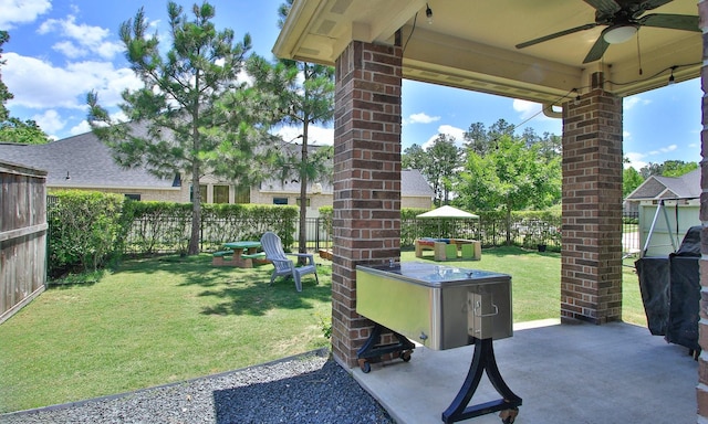 view of patio featuring a ceiling fan