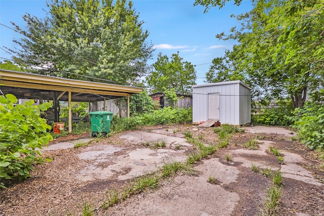 206 Shotwell St, Houston, TX 77020 - view of yard with a storage unit and an outdoor structure