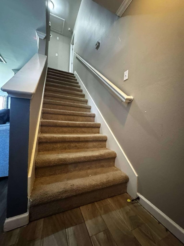 8206 Claiborne St, Houston, TX 77078 - staircase with wood finished floors and baseboards