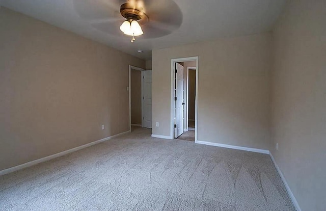 8206 Claiborne St, Houston, TX 77078 - carpeted spare room featuring a ceiling fan and baseboards