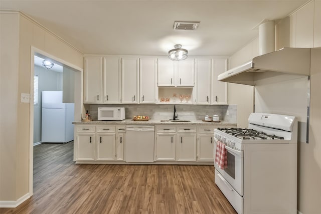 6738 Underhill St, Houston, TX 77092 - kitchen featuring white appliances, a sink, wall chimney range hood, light wood-type flooring, and backsplash