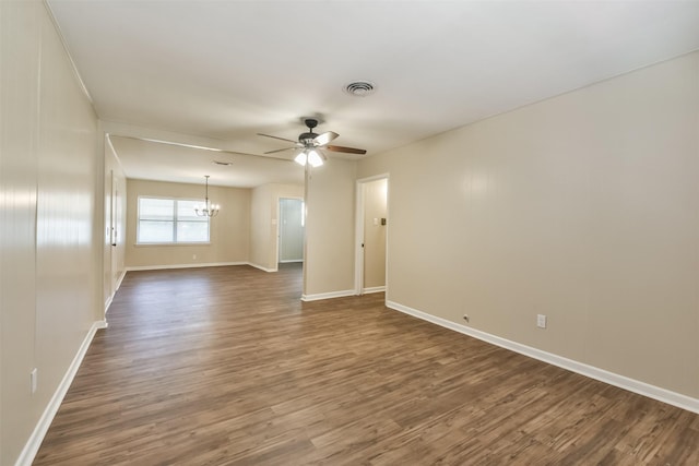 6738 Underhill St, Houston, TX 77092 - empty room featuring a chandelier, ceiling fan, and dark wood-style flooring