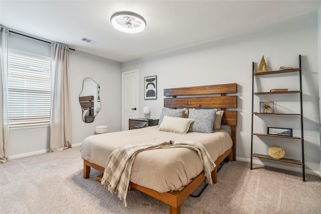 8811 Sandhill Crane Rd, Baytown, TX 77521 - carpeted bedroom featuring baseboards