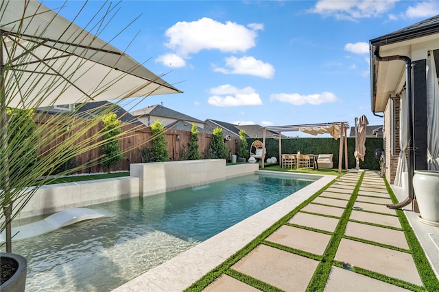 8811 Sandhill Crane Rd, Baytown, TX 77521 - view of swimming pool with a pergola, a fenced backyard, an outdoor hangout area, and a patio