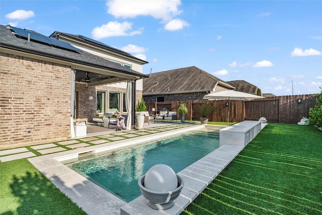 8811 Sandhill Crane Rd, Baytown, TX 77521 - view of swimming pool featuring an outdoor hangout area, ceiling fan, and a patio area