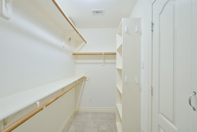 13313 Enchanted Way Dr, Montgomery, TX 77356 - walk in closet featuring carpet floors